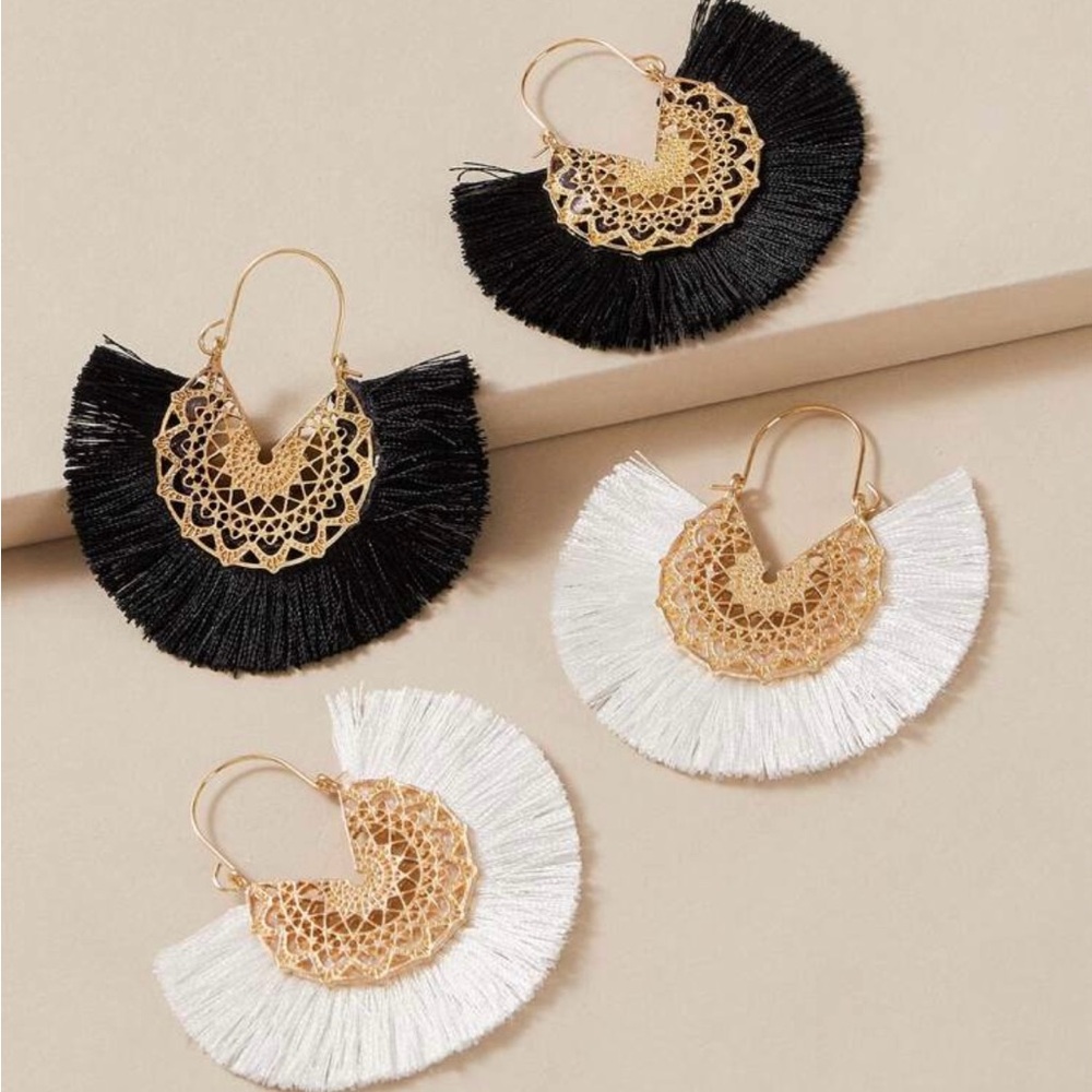 Black and white with gold detailing tassel earrings